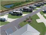 Seven motorhomes parked at RV site at WIND CREEK ATMORE CASINO RV PARK - thumbnail