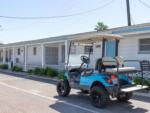 Golf cart in front of rentals at TROPIC ISLAND RESORT - thumbnail