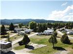 View larger image of Drone view of park with distant mountains at FAIRMONT RV RESORT image #1