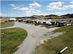 View larger image of View of gravel road and sites at FAIRMONT RV RESORT image #5