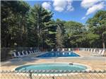 View larger image of Pool and hot tub surrounded by trees at HOLLY ACRES CAMPGROUND image #2