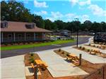 View larger image of A row of paved back in RV sites at PENSACOLA NORTH RV RESORT image #3