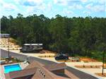 View larger image of An aerial view of a row of RV sites at PENSACOLA NORTH RV RESORT image #5