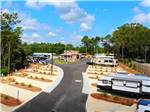 View larger image of Rows of paved back in campsites at PENSACOLA NORTH RV RESORT image #9