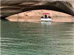 A couple of guys in a boat at Lake Powell nearby at FREMONT RIVER RV PARK - thumbnail