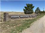 View larger image of The front entrance sign at CUERVO MOUNTAIN RV PARK AND HORSE HOTEL image #2