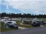 View larger image of A line up of petal boats on the water at ISLAND OAKS RV RESORT image #3