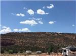 The nearby mountain with clouds at KAIBAB PAIUTE TRIBAL RV PARK - thumbnail