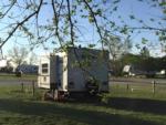 Parked RV trailer at site Bobcat Creek RV Park - thumbnail
