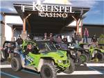 View larger image of A group of off road vehicles in front of the casino at KALISPEL RV RESORT image #12