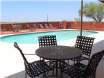 Sitting area at the pool at Cotulla Camp Resort - thumbnail