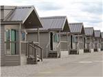 View larger image of A row of rental cabins at VERDE RANCH RV RESORT image #3