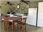 Kitchen and sitting area at Amigo Inn & RV Park - thumbnail