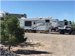 View larger image of A fifth wheel trailer in an RV site at CEDAR COVE RV PARK TOO image #1