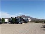 RV sites with mountains in the background at DESERT VIEW RV PARK - thumbnail