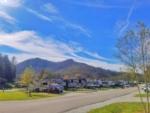 RV sites with mountains and blue skies at Willow Valley RV Resort - thumbnail