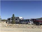 View larger image of A row of gravel RV sites at IRON SPRINGS ADVENTURE RESORT image #2