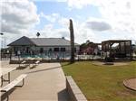 View larger image of Picnic benches by the swimming pool at R  R RV RESORT  CASITAS image #8
