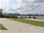 View larger image of A couple of empty paved RV sites at R  R RV RESORT  CASITAS image #9