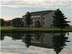 View larger image of The hotel building overlooking the lake at OAK TERRACE RV RESORT image #7
