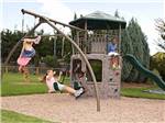 View larger image of Kids playing on the playground at OAK TERRACE RV RESORT image #9
