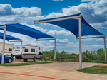 Covered RV spot at Space City Ellington - thumbnail
