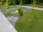 Paved site by the grass - thumbnail