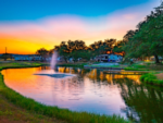 Lake with a fountain at Open Air Resorts Spicewood - thumbnail