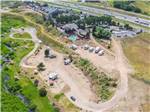 Aerial view of campground and creek at PARK CITY RV RESORT - thumbnail