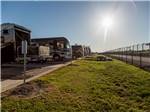 Motorhomes and trailers parked in paved sites at COTA CAMPING-PREMIUM RV PARK - thumbnail