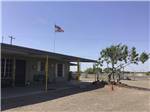 The American flag at the office at STINSON RV PARK & STORAGE - thumbnail