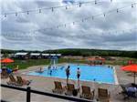 Kids playing in the swimming pool at DINOSAUR VALLEY RV PARK - thumbnail