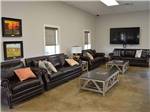 View larger image of Inside sitting area with couches at BRAZOS TRAIL RV PARK image #3