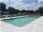 The fenced in swimming pool at DADE CITY RESORT - thumbnail