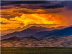 Sunset over the mountains nearby at COOL SUNSHINE RV PARK - thumbnail