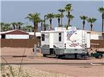 View larger image of An RV parked in one of the RV sites at CAMPGROUND USA RV RESORT image #2