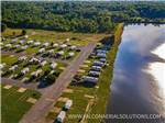 An aerial view of the campsites and water at COOK'S LAKE RV RESORT & CAMPGROUND - thumbnail