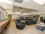 View larger image of Interior seating area and shuffleboard at CORRAL RV RESORT image #3