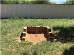 The horseshoe pit in a grassy area at SUNDANCE RV PARK - thumbnail