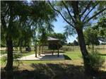 View larger image of A picnic table under a gazebo at STINSON RV PARK image #12