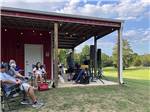 A group of people getting ready to listen to music at LAKE THURMOND RV PARK - thumbnail