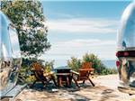 Chairs between two Airstreams - thumbnail