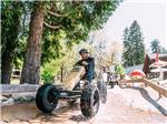 Men riding on a track - thumbnail