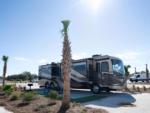 An RV parked in a site - thumbnail