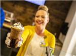 View larger image of A woman serving a coffee drink at 12 TRIBES LAKE CHELAN CASINO  RV PARK image #5