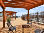 Covered seating area by the pool at Ridgeview RV Resort - thumbnail