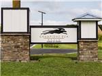 The front entrance sign at CHAMPIONS RUN LUXURY RV RESORT - thumbnail
