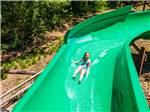 A child on a waterslide - thumbnail