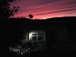 A cabin rental at night at QUINEBAUG COVE RESORT - thumbnail