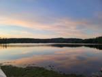 A view of the lake at sunset at QUINEBAUG COVE RESORT - thumbnail
